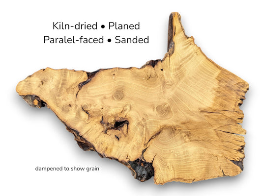 Irregular light brown wood slice showing grain patterns with text overlay indicating kiln-dried and sanded status.