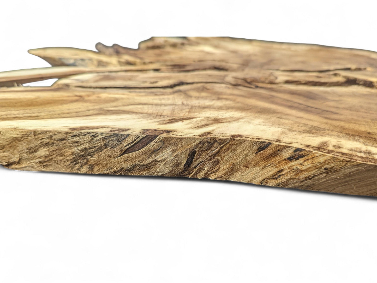 Organic-shaped root wood slice with a natural live edge, showing brown tones, intricate grain, and surface cracks.