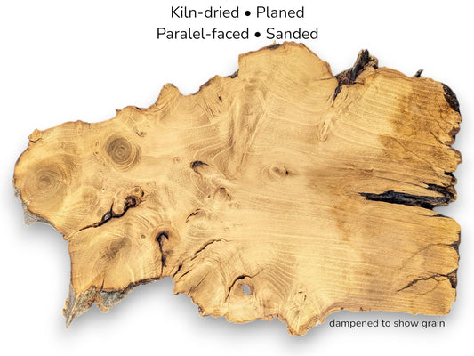 Golden-brown wood slice showing swirling grain and knots, with text detailing kiln-dried and sanded status.
