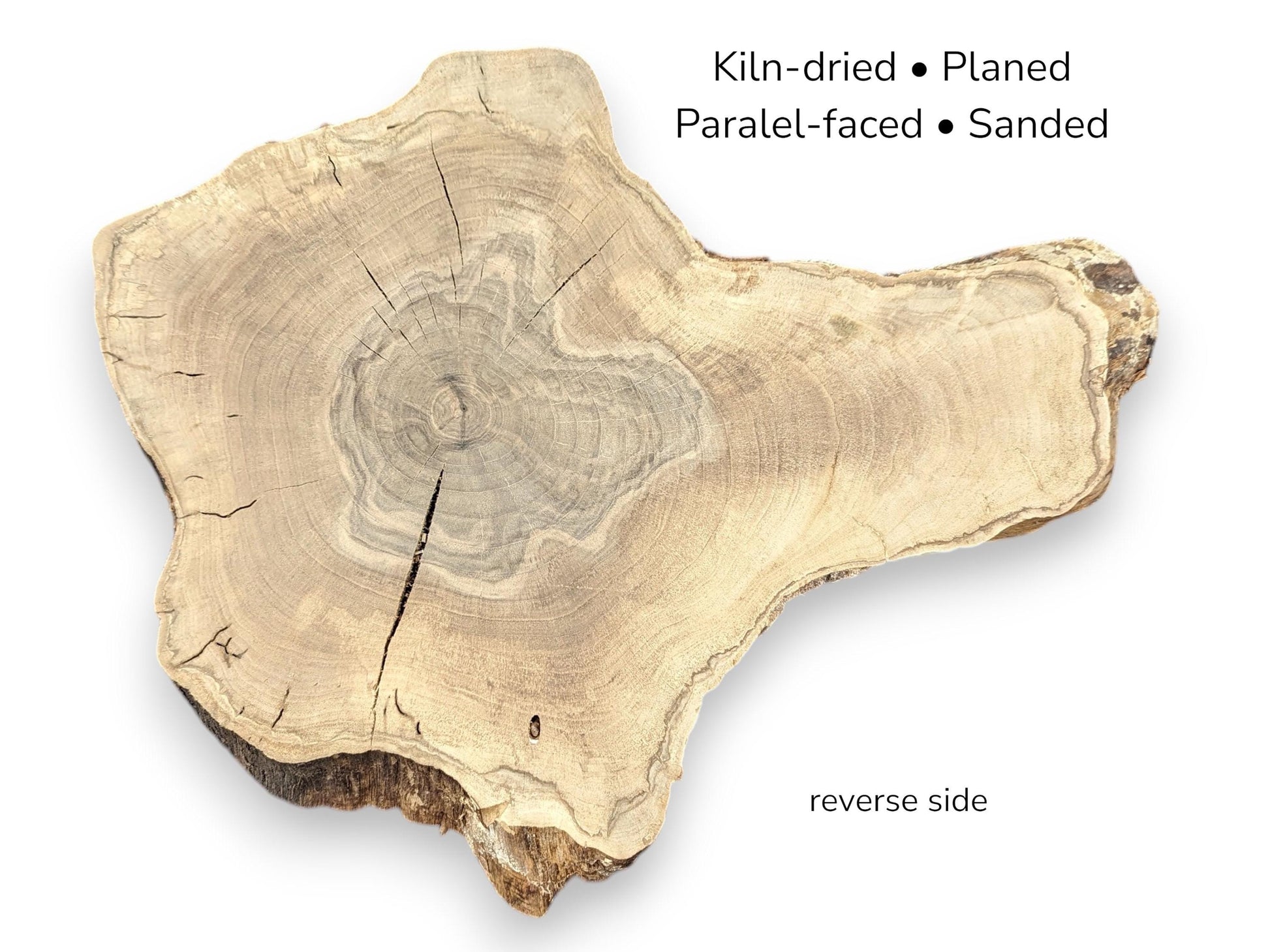 Irregular, light brown wood slice with tree rings, cracks, and overlay text detailing preparation and side.